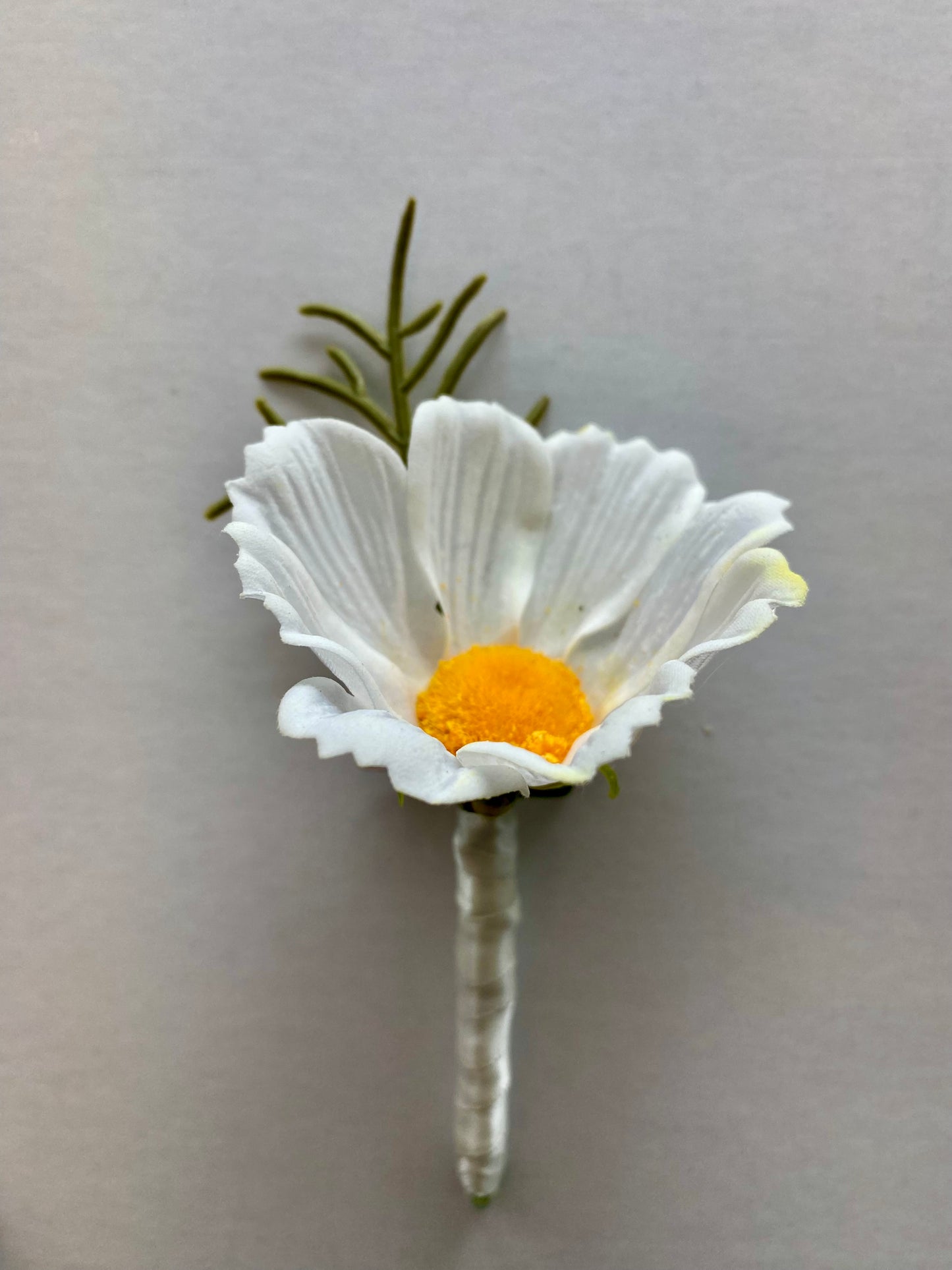 Real Touch White Cosmos Buttonhole With Greenery